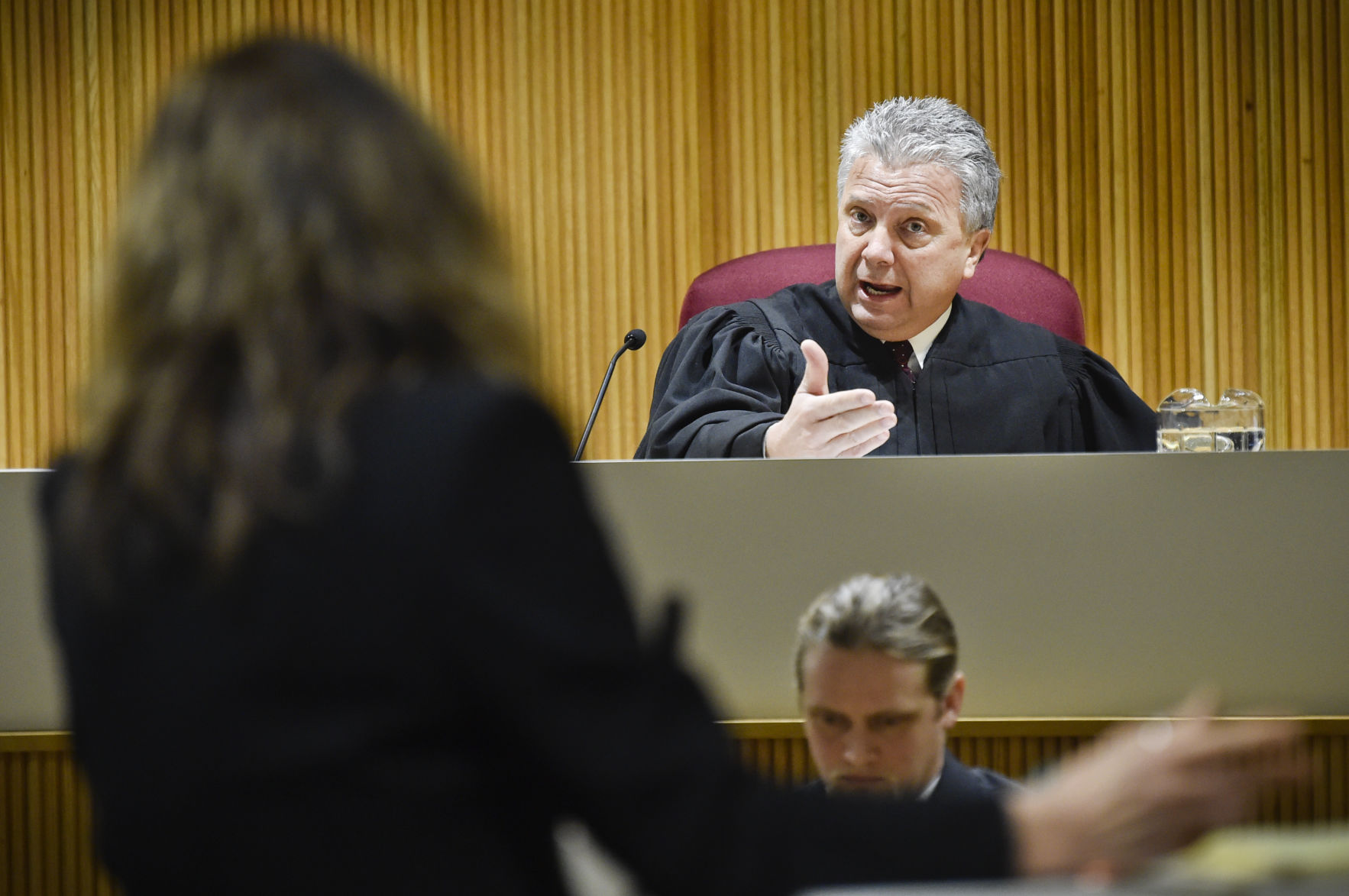 Montana Supreme Court Justice Dirk Sandefur, right, questions Maureen Lennon,
